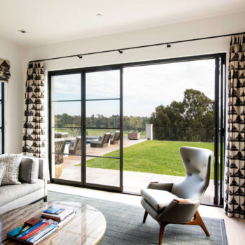 Slightly different angle of Euroline Steel Windows and Doors sliding door in a modern living room.
