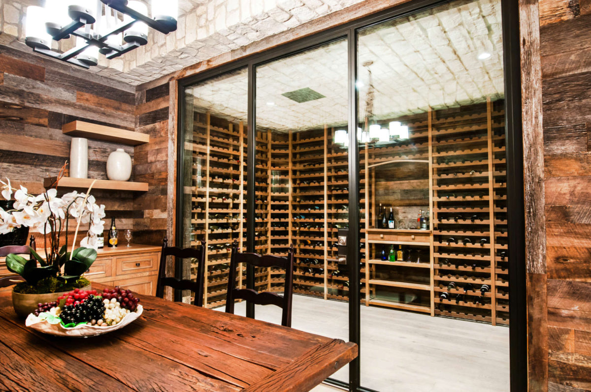 Rustic Euroline Steel Windows and Doors wine room doors in a traditional setting.